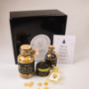 Kerst cadeaupakket met handzeep, kaars, lucifers en pin