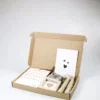 Brievenbus cadeau Veel liefs – geurzakje, swirl kaarsen & deco frame Brievenbus cadeau Veel liefs – geurzakje, swirl kaarsen & deco frame