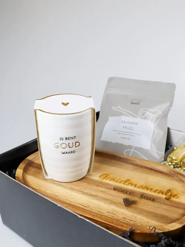 Kerstcadeaupakket gouden genietpauze met mok, thee en kaars