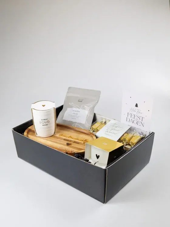Kerstcadeaupakket gouden genietpauze met mok, thee en kaars