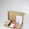 Brievenbus cadeau veel liefs met hart waxinelichtjes en thee